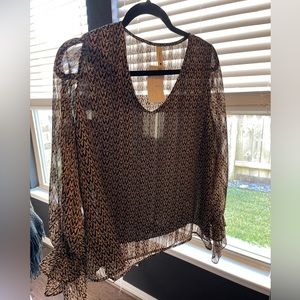 Top with ruffle cuffs.